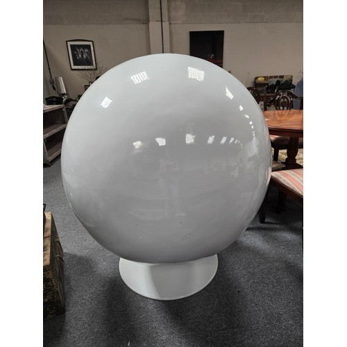 807 - An Iconic Mid Century Eero Aarnio ball chair features glossy white fiberglass shell with vibrant ora... 