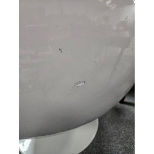 807 - An Iconic Mid Century Eero Aarnio ball chair features glossy white fiberglass shell with vibrant ora... 