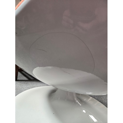 807 - An Iconic Mid Century Eero Aarnio ball chair features glossy white fiberglass shell with vibrant ora... 