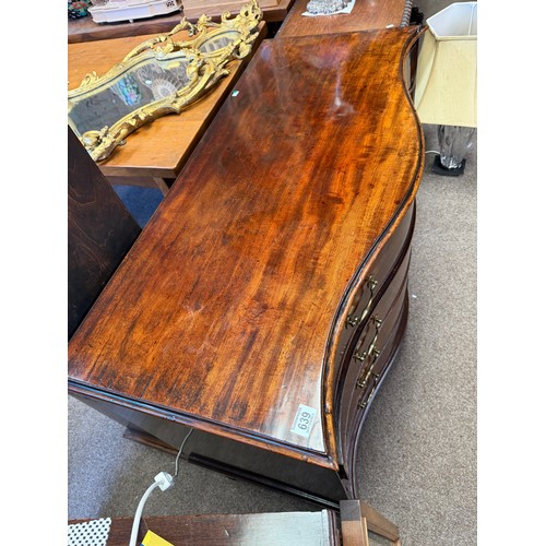 639 - A Regency mahogany serpentine chest of drawers, comprising four drawers with brass swan neck handles... 