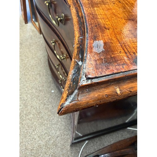 639 - A Regency mahogany serpentine chest of drawers, comprising four drawers with brass swan neck handles... 