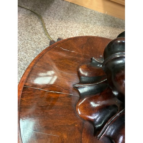 598 - A pair of William IV rosewood pedestal card tables, having a carved frieze above swept support on ci... 
