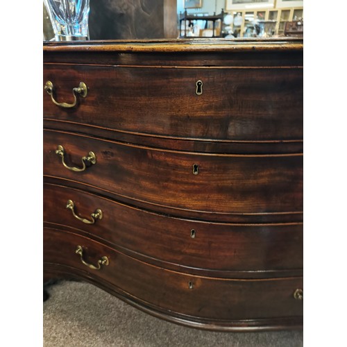 639 - A Regency mahogany serpentine chest of drawers, comprising four drawers with brass swan neck handles... 
