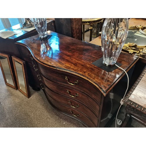 639 - A Regency mahogany serpentine chest of drawers, comprising four drawers with brass swan neck handles... 