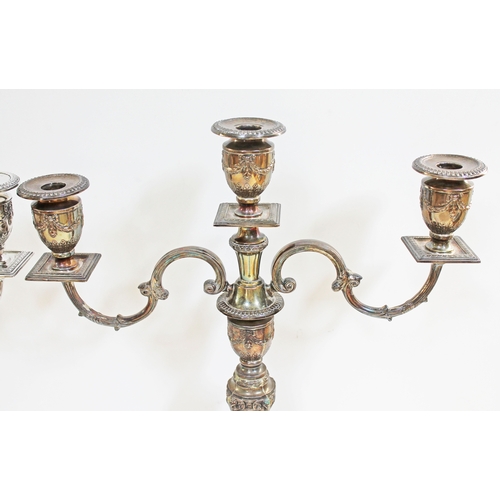 102 - A large pair of Neo Classical style silver candelabra, Barker Ellis Silver Co, Birmingham 1973, each... 