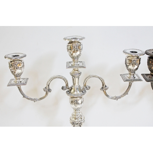 102 - A large pair of Neo Classical style silver candelabra, Barker Ellis Silver Co, Birmingham 1973, each... 