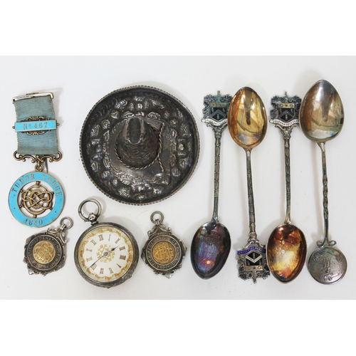 129 - A mixed lot of silver comprising a Sterling silver Mexican hat, three Oldham Golf Club hallmarked si... 