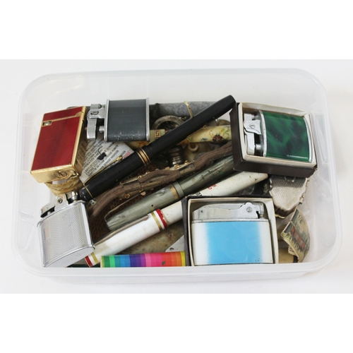 131 - A mixed lot including a Conway Stewart fountain pen with 14k nib and other pens, an Omega lighter an... 