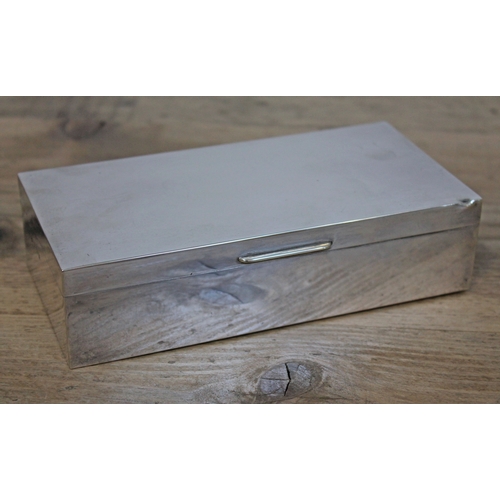 134 - A hallmarked silver box by Mappin & Webb, length 17.5cm.