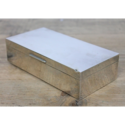 134 - A hallmarked silver box by Mappin & Webb, length 17.5cm.