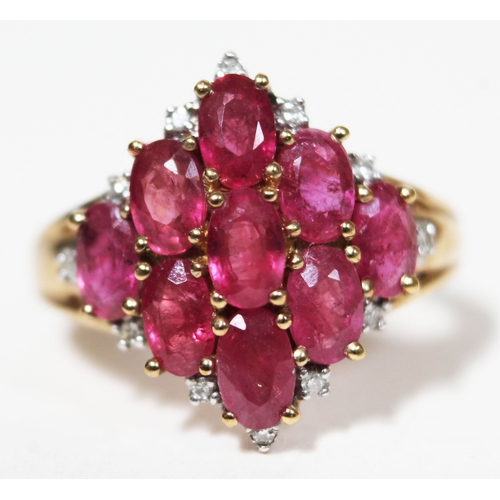 143 - A ruby and diamond ring, hallmarked 9ct gold, gross wt. 3.6g, size M.