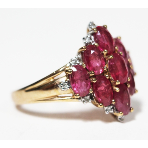 143 - A ruby and diamond ring, hallmarked 9ct gold, gross wt. 3.6g, size M.