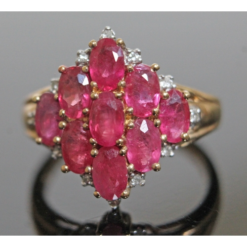 143 - A ruby and diamond ring, hallmarked 9ct gold, gross wt. 3.6g, size M.