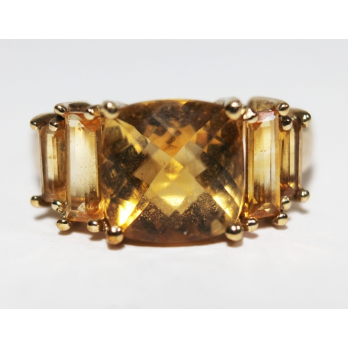 144 - A hallmarked 9ct gold citrine ring, gross wt. 3g, size N.