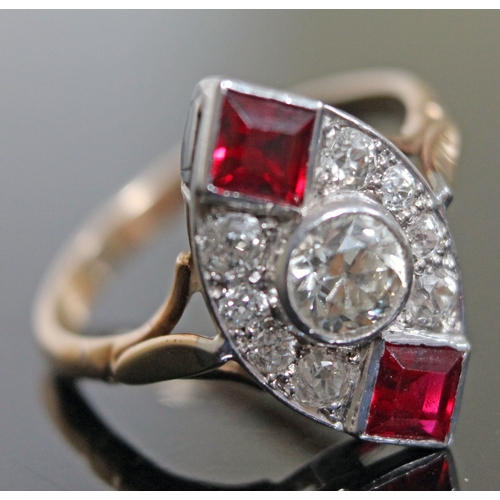 145 - An Art Deco diamond and ruby coloured stone ring, the central stone approx. 0.50 carats, yellow and ... 