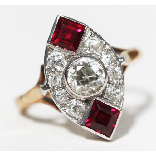 145 - An Art Deco diamond and ruby coloured stone ring, the central stone approx. 0.50 carats, yellow and ... 