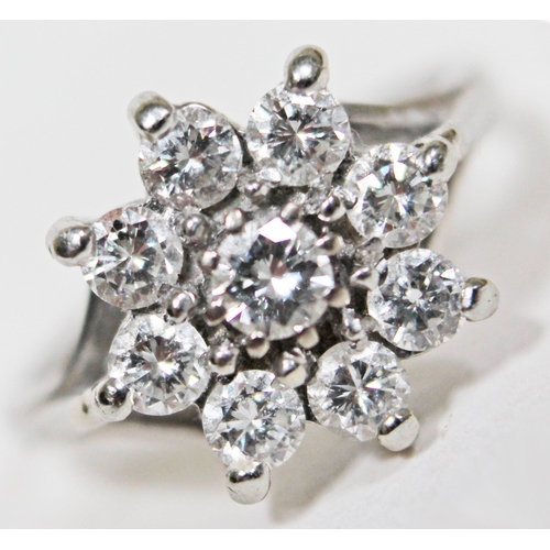 147 - A flower set diamond cluster ring, 9 stones gross wt. approx. 1 carat, hallmarked 18ct white gold ba... 