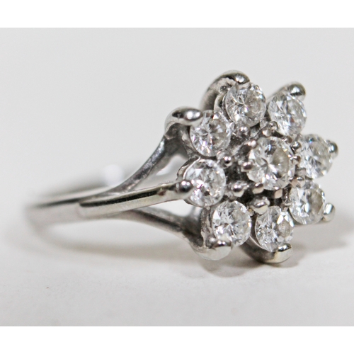 147 - A flower set diamond cluster ring, 9 stones gross wt. approx. 1 carat, hallmarked 18ct white gold ba... 