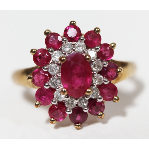 150 - A hallmarked 9ct gold ruby and diamond cluster ring, gross wt. 2.5g, size M.