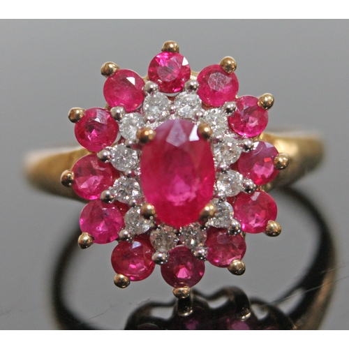 150 - A hallmarked 9ct gold ruby and diamond cluster ring, gross wt. 2.5g, size M.