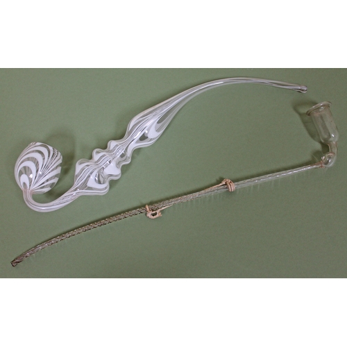 355 - Two 19th Century glass pipes, length 34cm & 38cm.