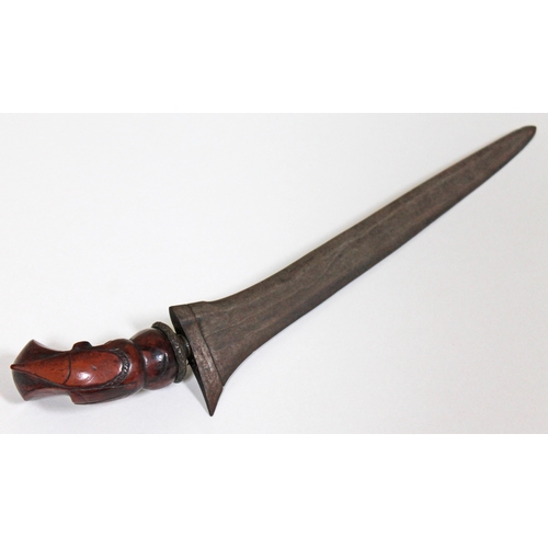 356 - A 19th Century Malayan kris with double edge steel blade and carved wood handle, length 36cm, lackin... 