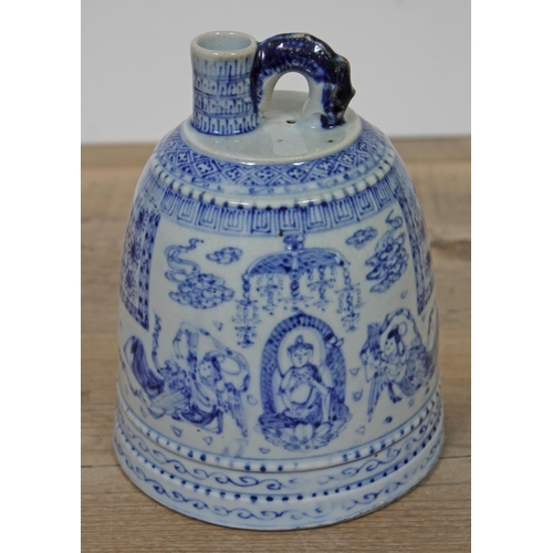 367 - An unusual eastern blue and white flask or wine pot of beehive form, decorated with figures and scri... 