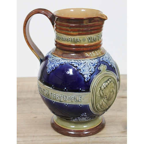 368 - A Royal Doulton Lambeth stoneware jug commemorating Queen Victoria 1897 jubilee, height 23cm.