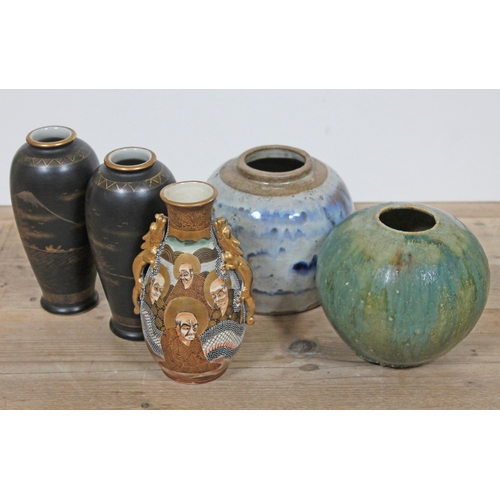 370 - A mixed lot of pottery comprising three Japanese vases, a blue and white ginger jar and an art potte... 