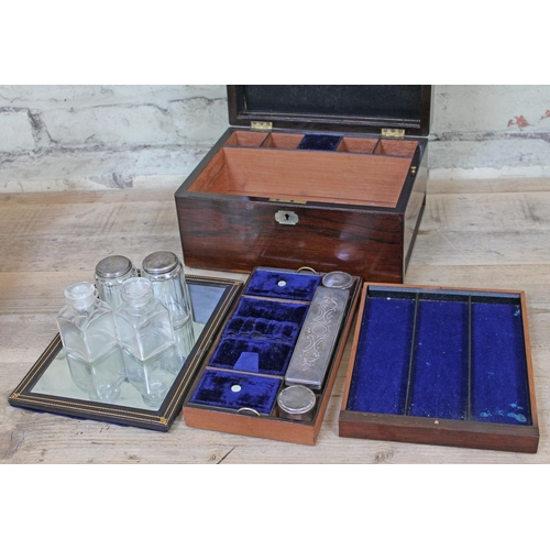 62 - A 19th Century rosewood sewing or work box, having blue velvet lined and tooled leather fitted inter... 