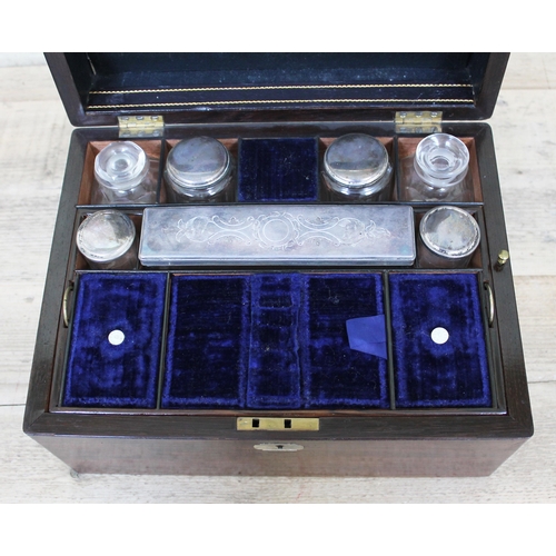 62 - A 19th Century rosewood sewing or work box, having blue velvet lined and tooled leather fitted inter... 