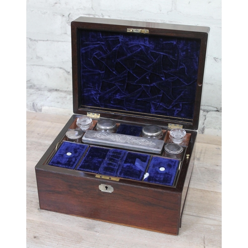 62 - A 19th Century rosewood sewing or work box, having blue velvet lined and tooled leather fitted inter... 