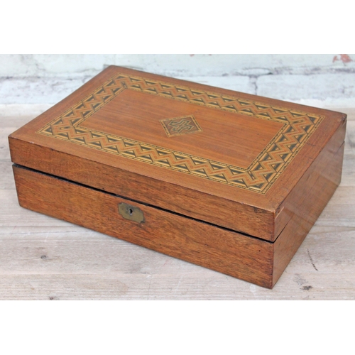 63 - A Victorian parquetry inlaid work box with interior tray, length 40cm, depth 26cm & height 12cm.