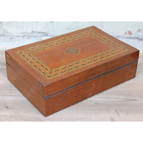 63 - A Victorian parquetry inlaid work box with interior tray, length 40cm, depth 26cm & height 12cm.