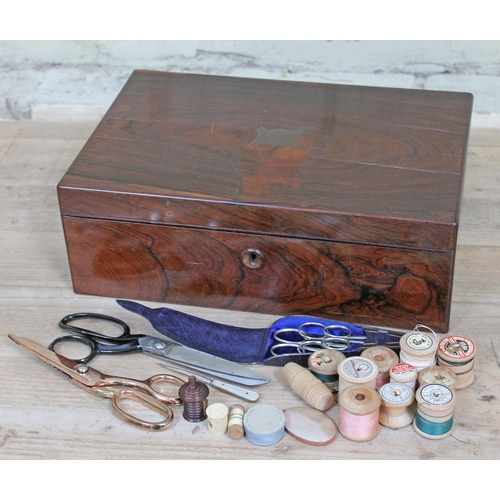 64 - A Victorian rosewood box with sycamore lined interior and various sewing accoutrements including sci... 