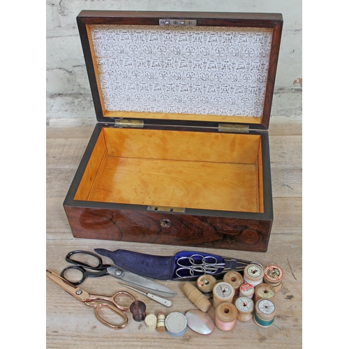 64 - A Victorian rosewood box with sycamore lined interior and various sewing accoutrements including sci... 