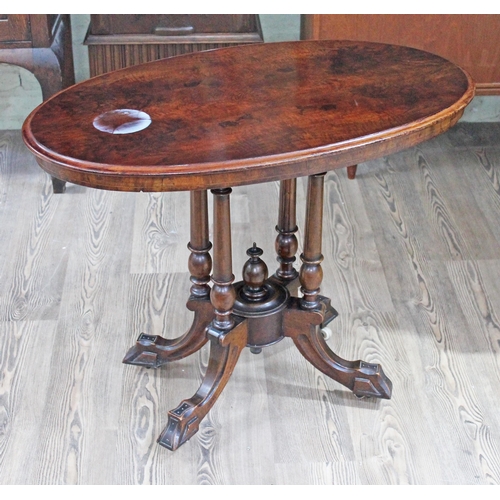 65 - A Victorian figured walnut occasional table.