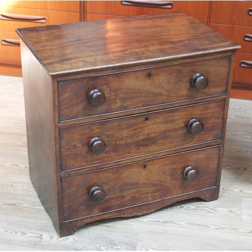 67 - A 19th Century mahogany three drawer chest of drawers with bun handles, width 77cm, depth 47cm & hei... 