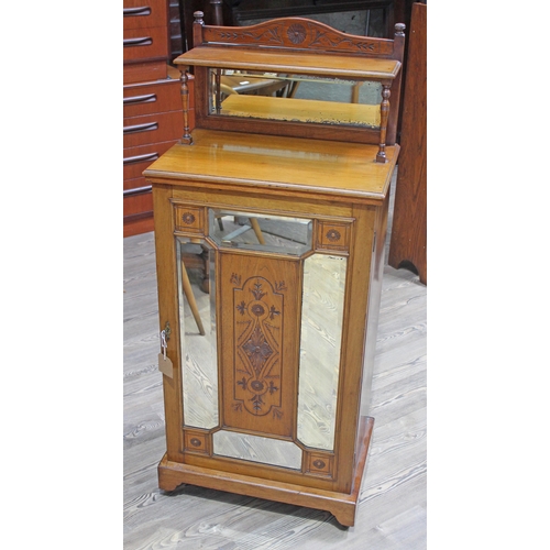 68 - A late Victorian Aesthetic music cabinet with mirror panelled door, superstructure with mirror back ... 