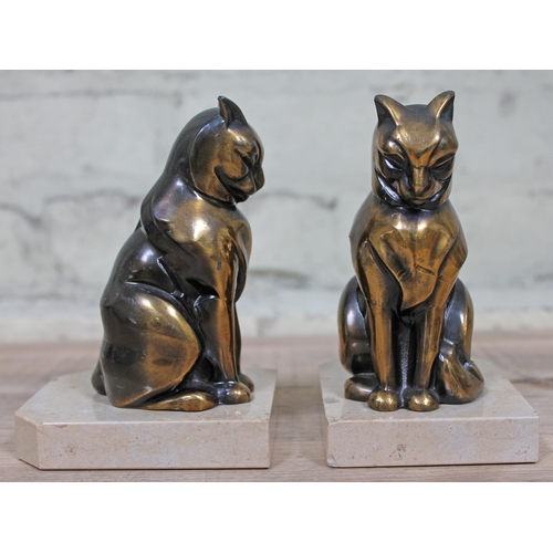 379 - A pair of Art Deco spelter figures formed as stylised cats on marble bases, signed 'Franjou', height... 