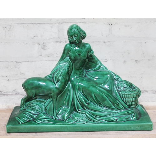 380 - A green Art Deco style figure, signed 'Polbert', length 54cm.