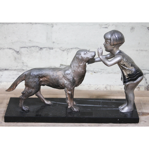 381 - An Art Deco spelter figure formed as a girl and dog on marble base, signed 'P Sega', length 36cm.