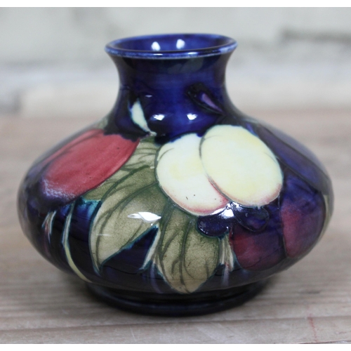 392 - A Moorcroft pottery squat vase, height 8cm.