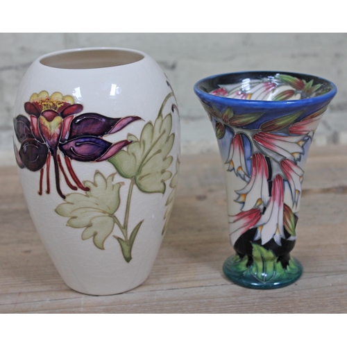 393 - Two Moorcroft pottery vase, height 16cm & 18cm.