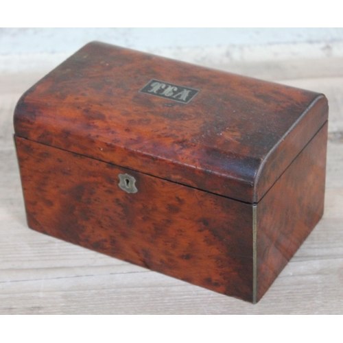 394 - 19th century amboyna tea caddy, length 21cm.