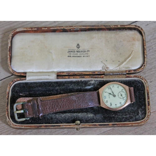 405 - A 9ct gold wristwatch the dial inscribed 'Walker Century', with leather strap and box.