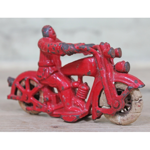 411 - A Hubley cast iron Harley Davidson motorcycle and rider, length 14cm.