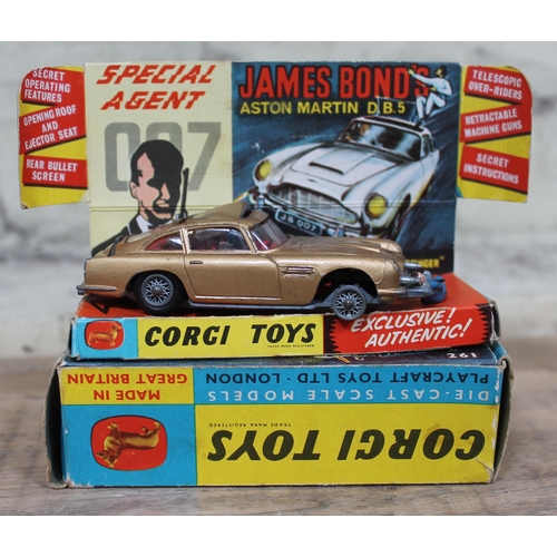 413 - A mixed lot of toys including a Corgi Toys 261 James Bond DB5, a Corgi Toys 253 Mercedes-Benz 220 SE... 