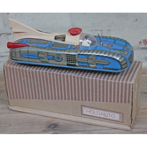 426 - A Holdauto Interkozmosz tinplate battery operated toy vehicle.