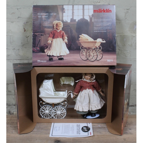 428 - A Marklin doll and pram 1611, boxed with certificate.